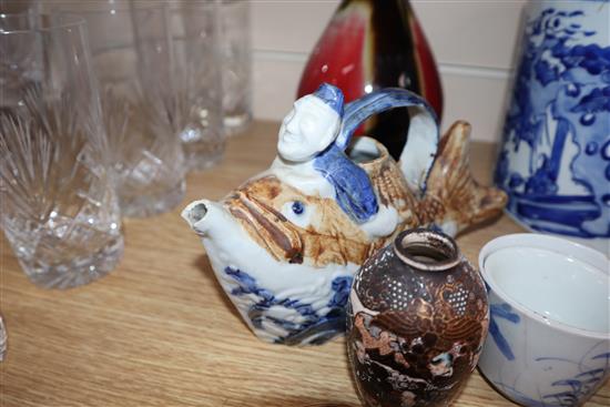 A quantity of Chinese and other porcelain including tea bowls, a bottle vase and a large blue and white brush pot